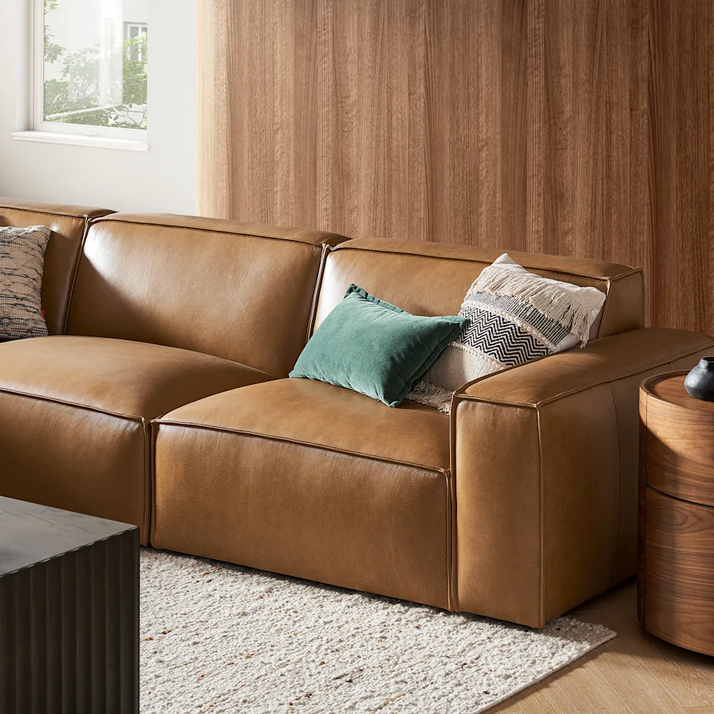 627-jonathan-leather-chaise-sectional-sofa-with-ottoman–1.jpg