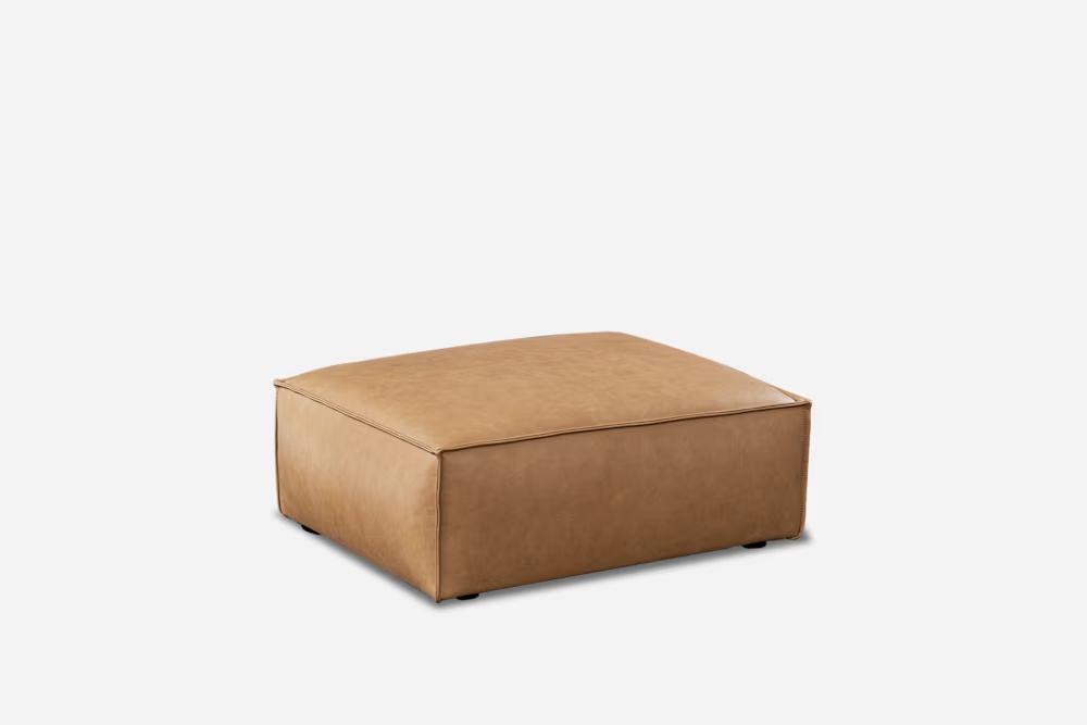 82-jonathan-leather-ottoman–1.webp
